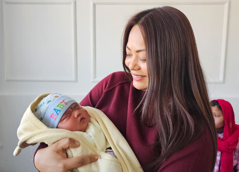 Mother holding baby
